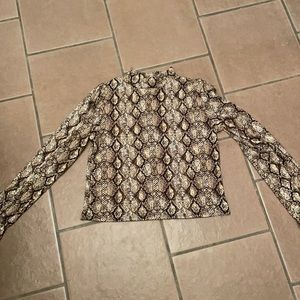 Snake skin turtle neck